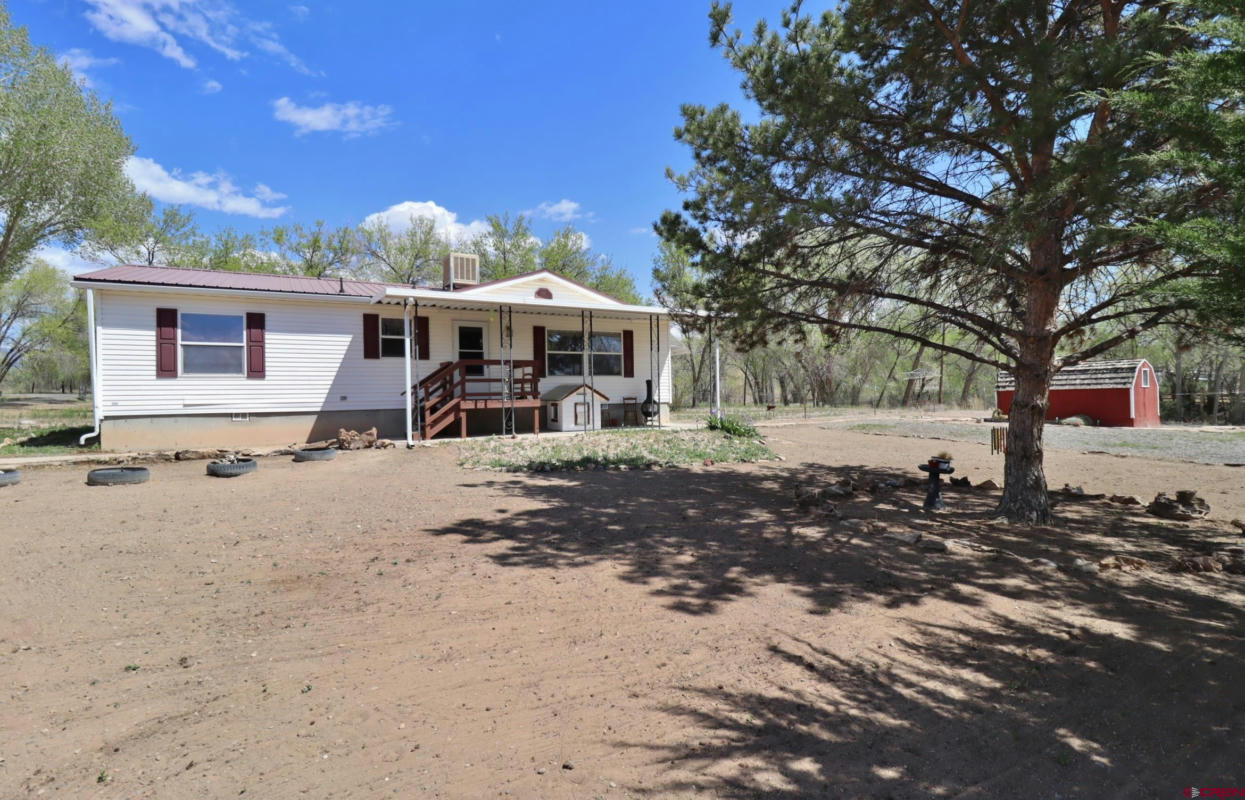 21274 KNIGHT RD, AUSTIN, CO 81410, photo 1 of 35