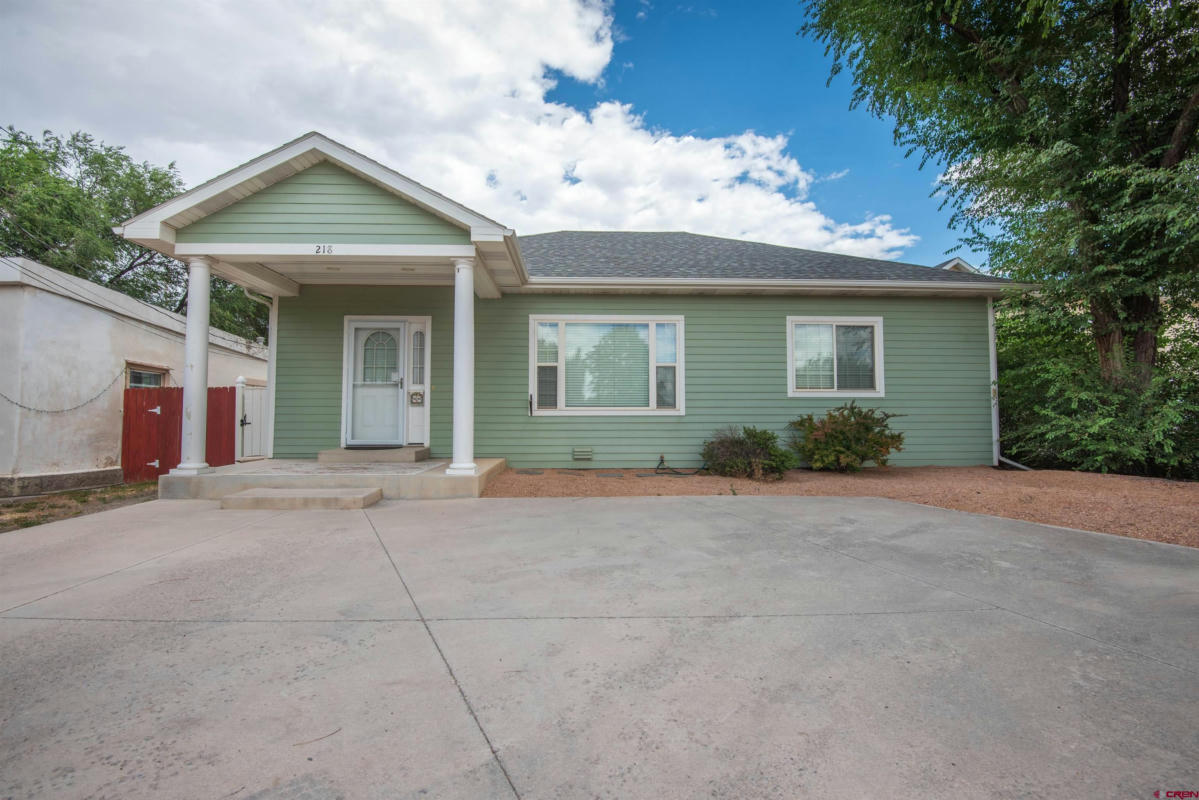 218 N STOUGH AVE, MONTROSE, CO 81401, photo 1 of 35
